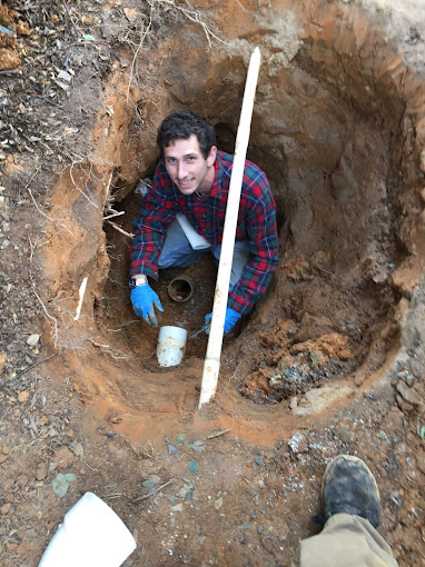 Professional plumber working